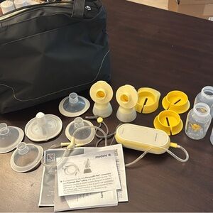 Medela Breast Pump Kit with Yellow and White Parts